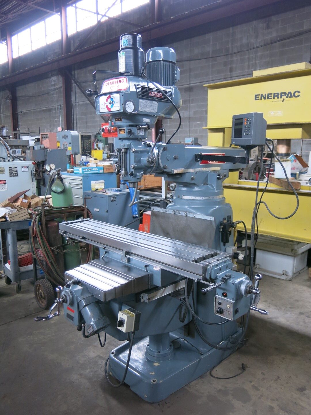 Clausing Kondia 11″ x 58″ Vertical Milling Machine