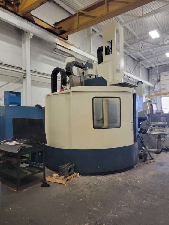 Olympia V60L, CNC VTL, Fanuc 180i-T, 30 ATC, Movable column, 66