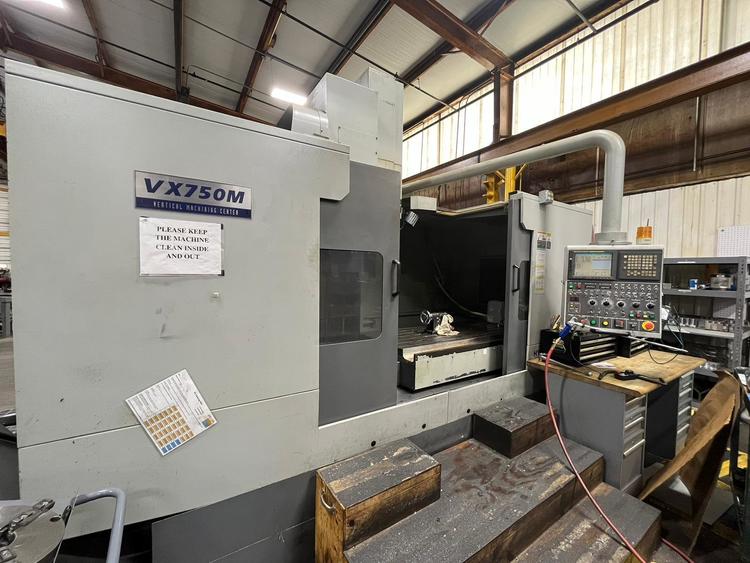 HYUNDAI KIA VERTICAL MACHINING CENTER MODEL VX750M. FANUC 18i-MB CNC CONTROLS. NEW IN 2007